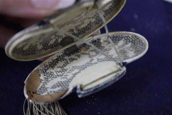 Two 19th century Chinese ivory pomanders and a similar purse